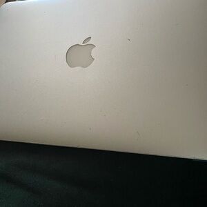 Apple Silver MacBook with Sleek Design and Iconic Logo